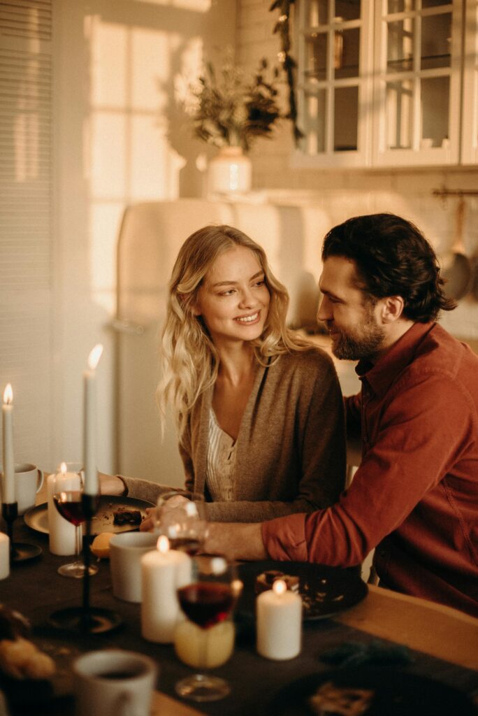 pexels-photo-3171204-3171204 A serene romantic dinner setting with a couple enjoying candlelight, wine, and happiness.
